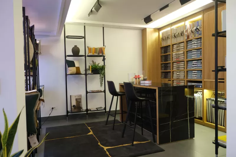 Sample-book wall and meeting table